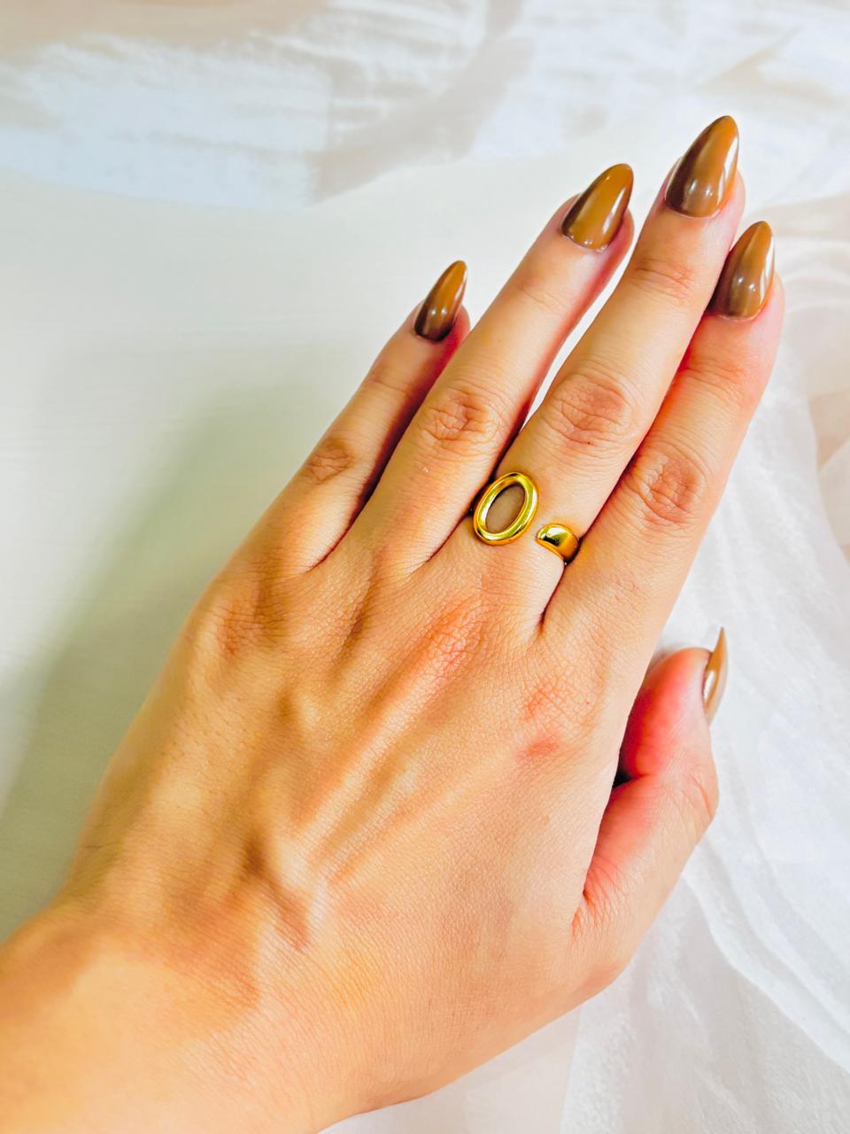 GOLDEN OVAL HALO RING