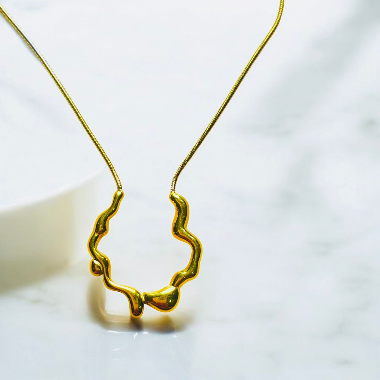 MOLTEN WAVE NECKLACE